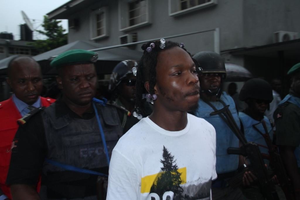 Naira Marley arrested by the EFCC. Counting the cost as Nigerian fraud goes global