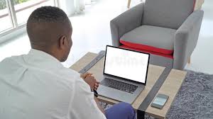 Image result for A black individual using a laptop