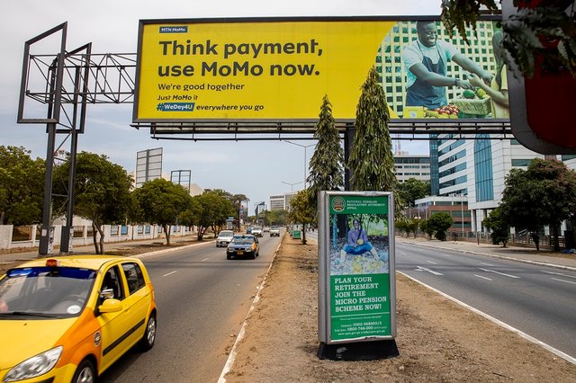 MTN mobile money billboard ad.
