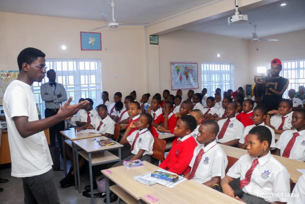 nwanchuku talking to secondary school students in a class