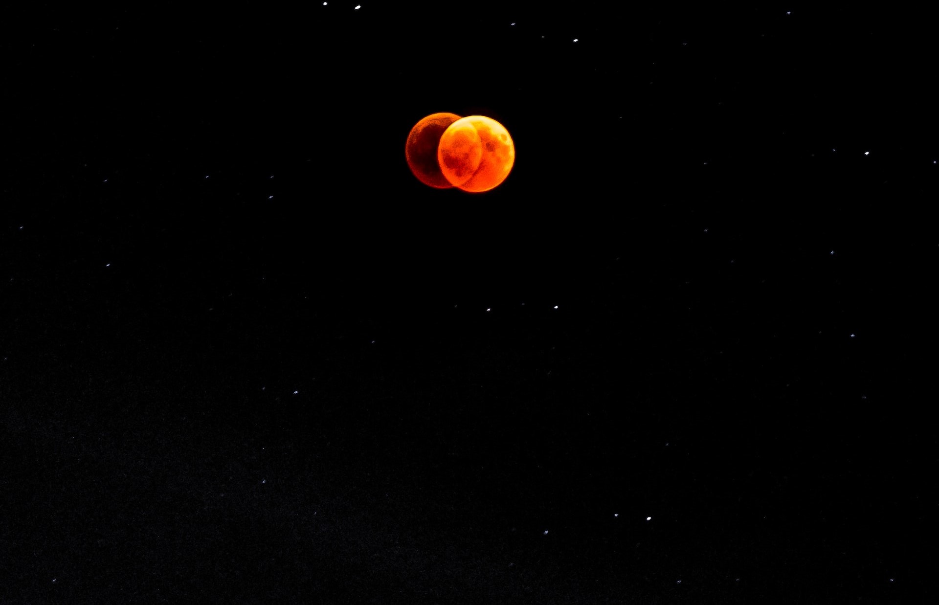 A night snapshot of a 2018 ‘Blood Moon’ eclispe. Photo by Luca Iaconelli via Unsplash.