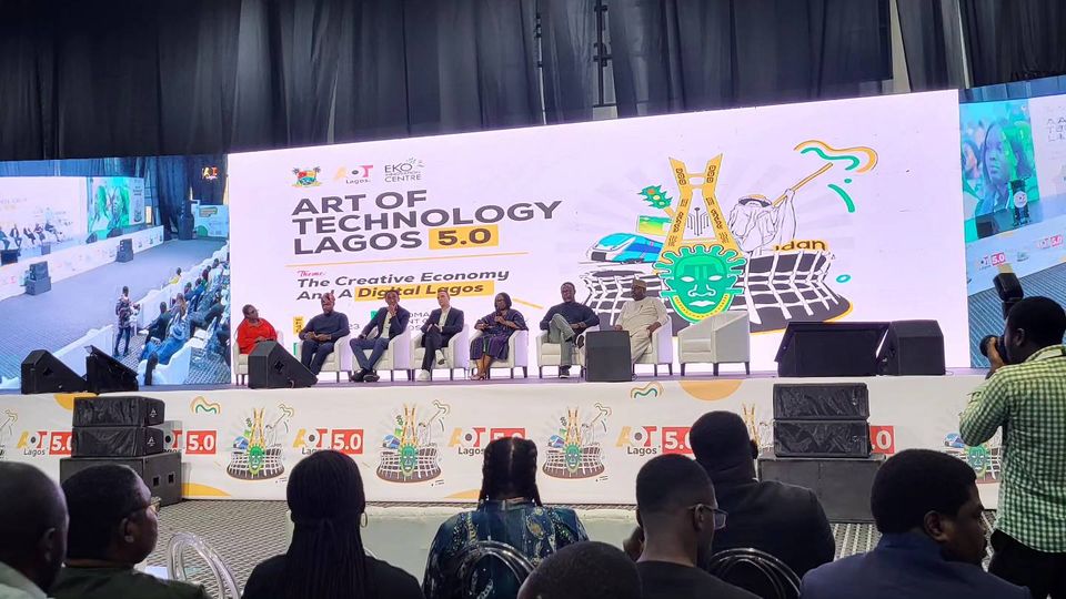 Speakers seated at the Art of Technology conference