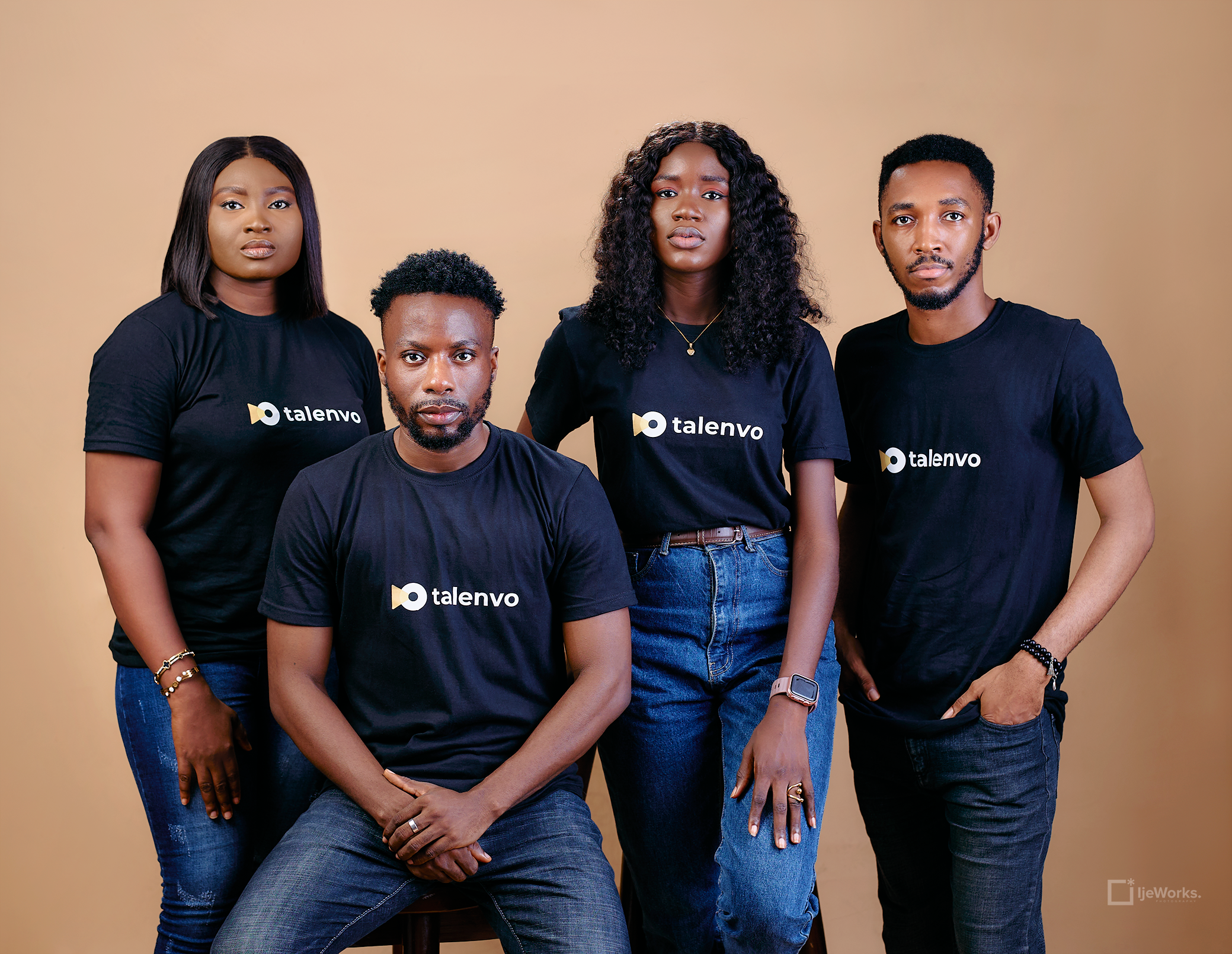 The Talenvo team, that helps provide employement for tech professionals wearing black and standing