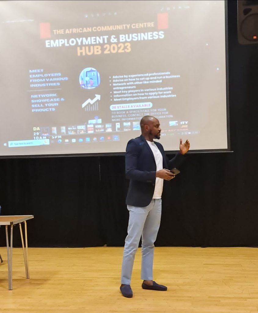 Dr. Adekunle delivering a conference paper at The African Community Center Employment and Business Hub 2023 in UK.