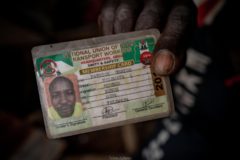 A Yelwata resident in Benue who survived the attack search for remains in his burnt house.