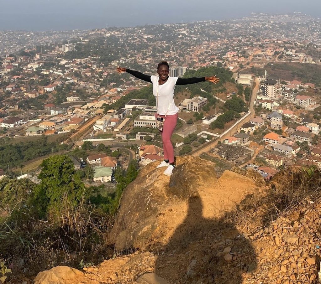 Oke hiking the Leicester Peak, a mountain in Sierra Leone’s Western area.